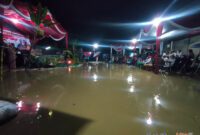 Semarak puncak HUT RI ke-77 di Kampung Rancabali, Desa Padalarang meriah meskipun genangan air mengelilingi lokasi hadir wakil Ketua DPRD KBB, Pipih Supriati (foto: Abdul) dok. SekitarKita